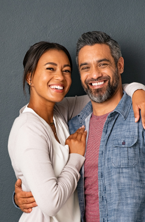 Two people smiling