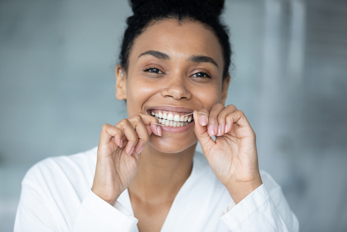 woman flossing